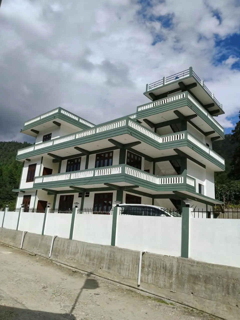 Front view of Dorjee Homestay with boundary wall